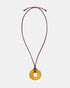 Golden agate donut pendant necklace on adjustable burgundy cord