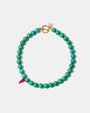Turquoise bead necklace with handmade red glass chili pepper charm