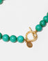 Turquoise gemstone necklace with gold-tone clasp detail