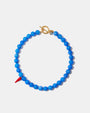 Blue agate bead necklace with handmade red glass chili pepper charm