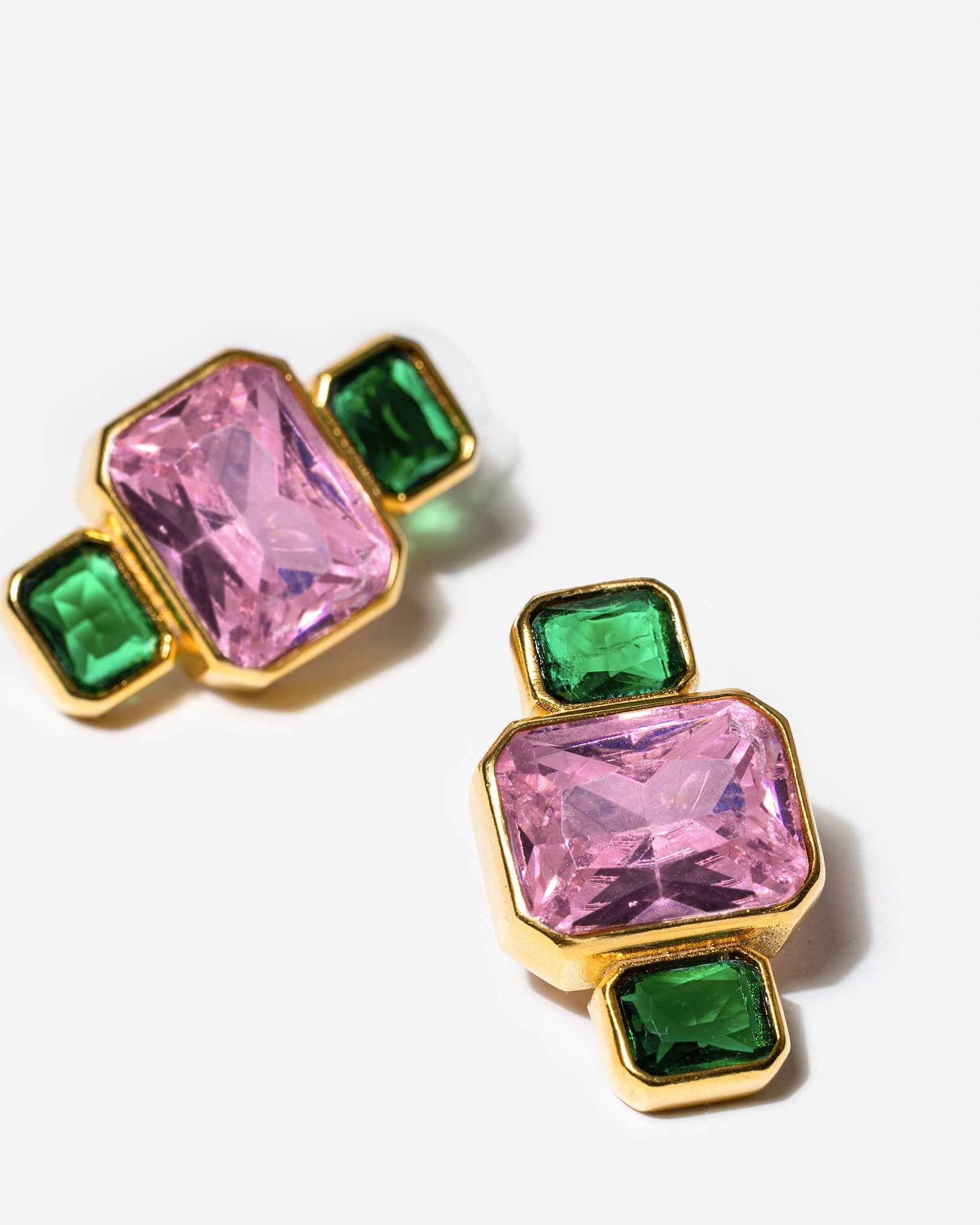 Gold geometric earrings with pink and green gemstones