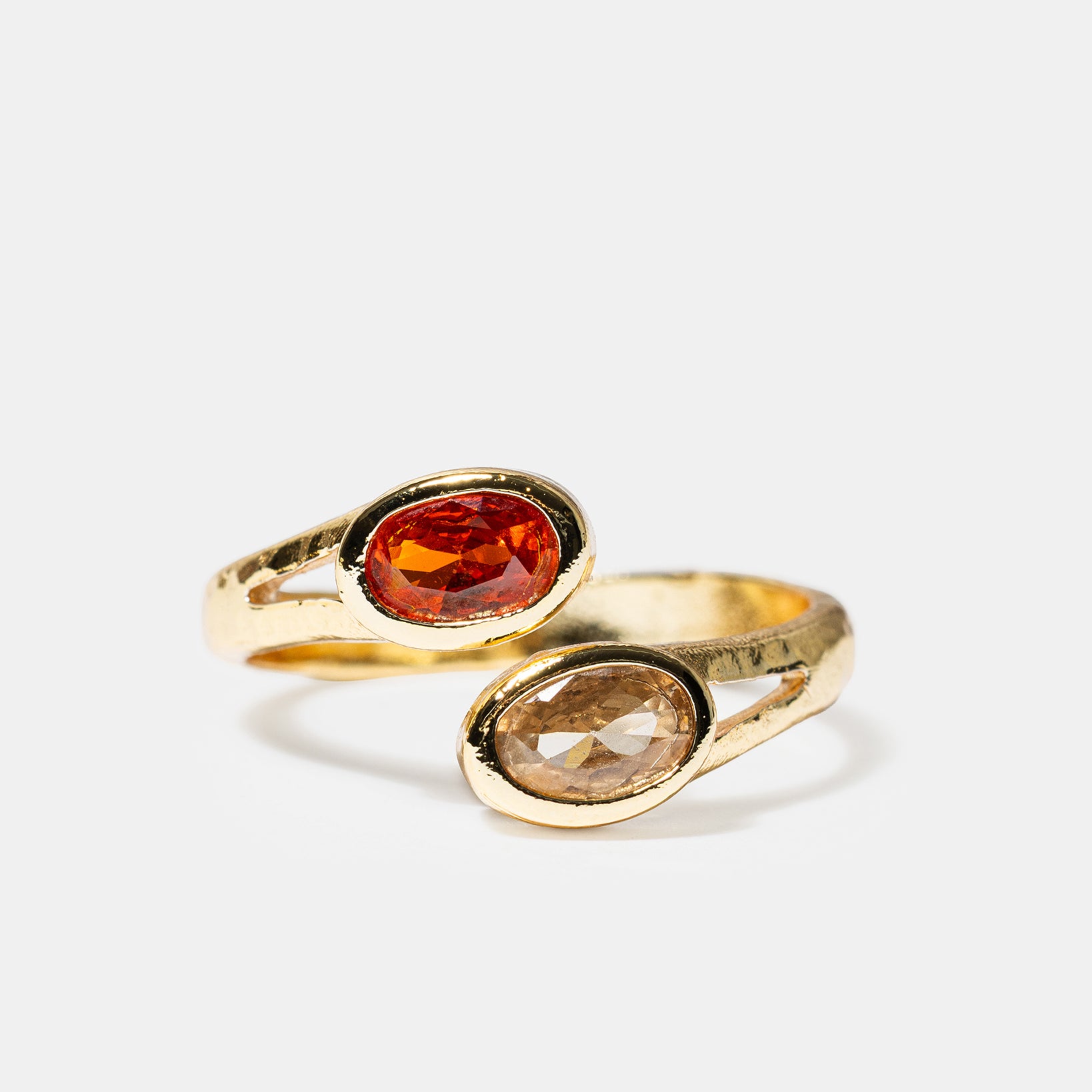 Gold open ring with oval pink and champagne gemstones