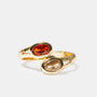 Gold open ring with oval pink and champagne gemstones