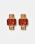 Gold geometric stud earrings with pink and amber gemstones