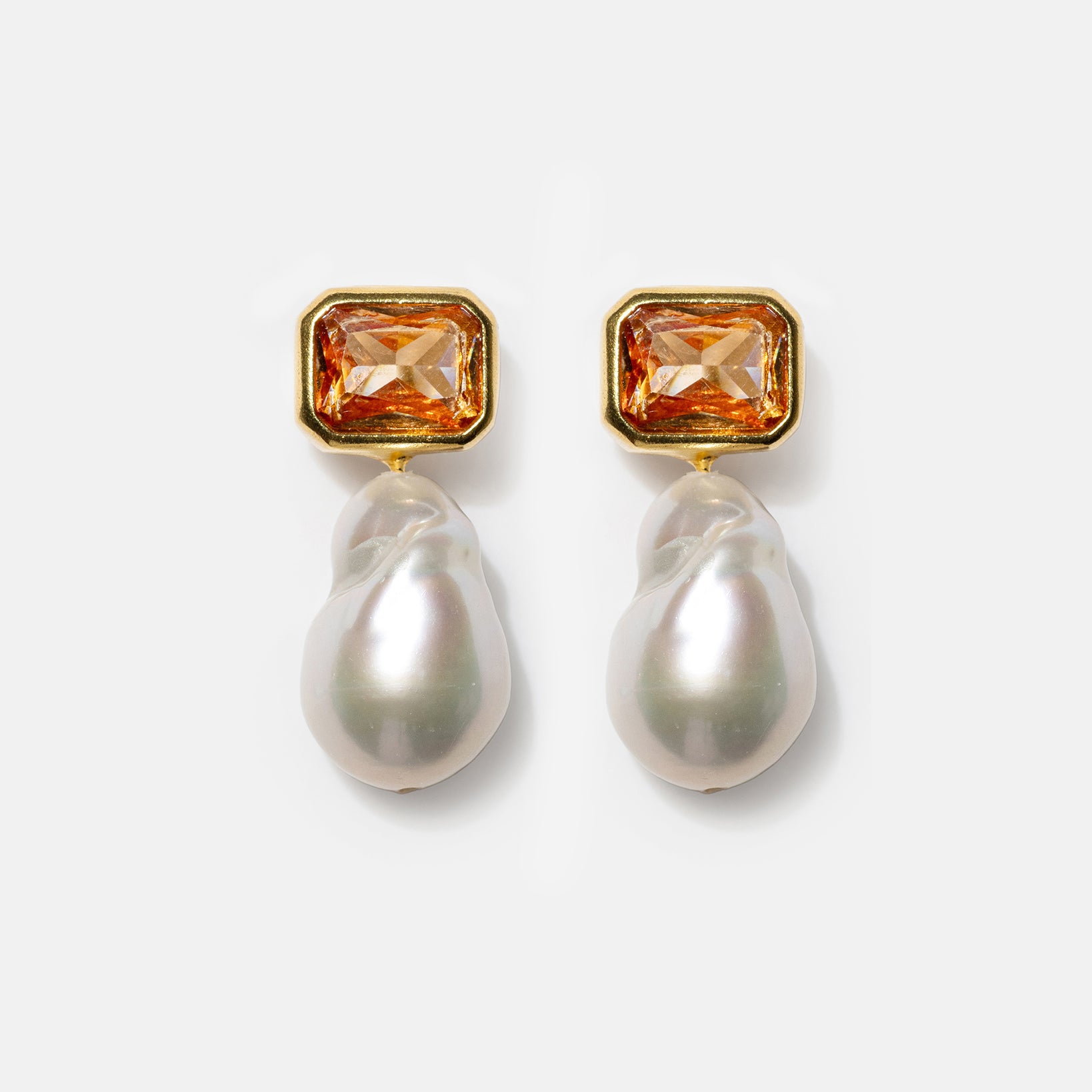 Gold pearl drop earrings with champagne gemstones