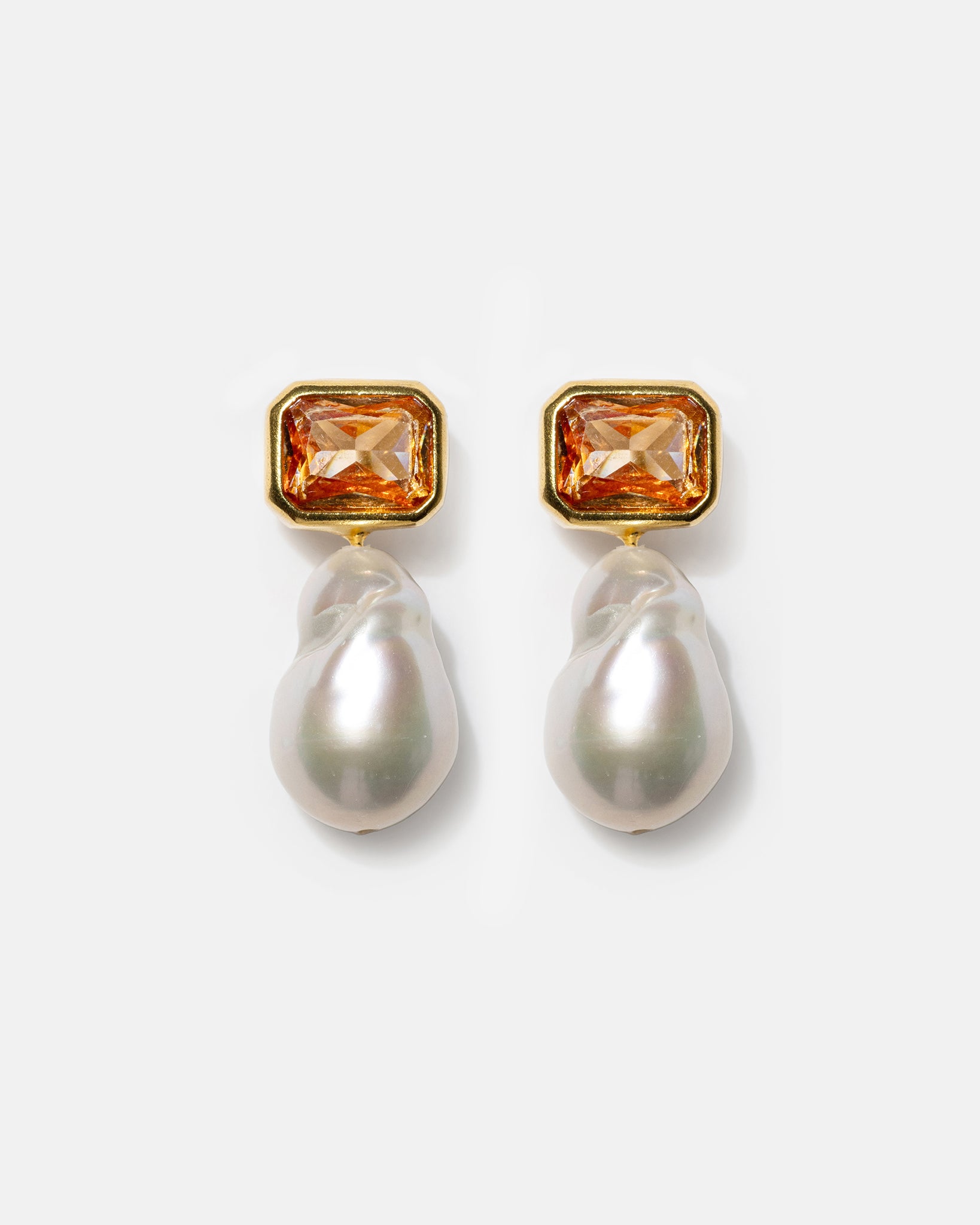 Gold pearl drop earrings with champagne gemstones