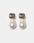 Gold pearl drop earrings with blue gemstones
