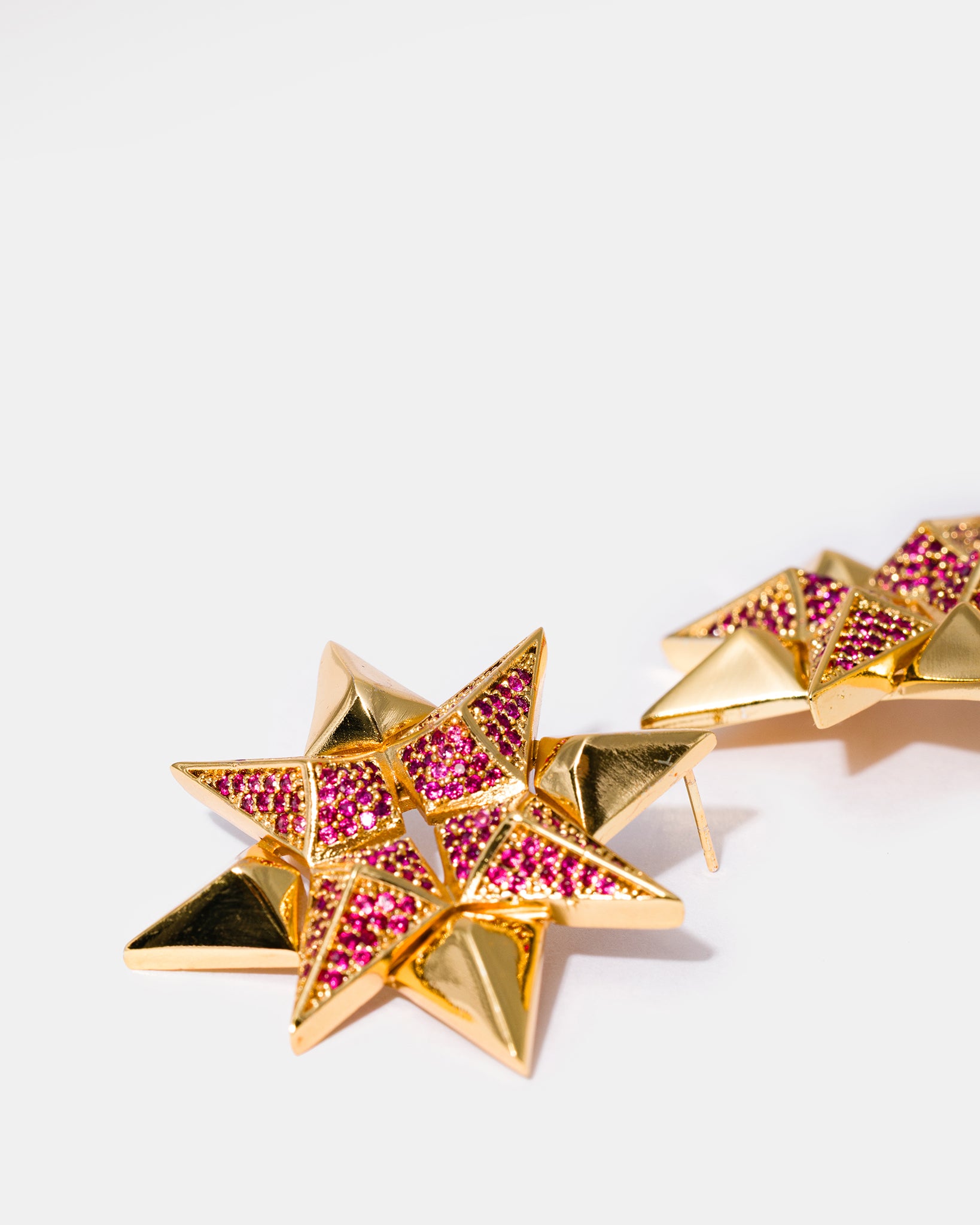 Gold Starburst Earrings in Ruby