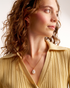 Minimal pearl necklace styled on model