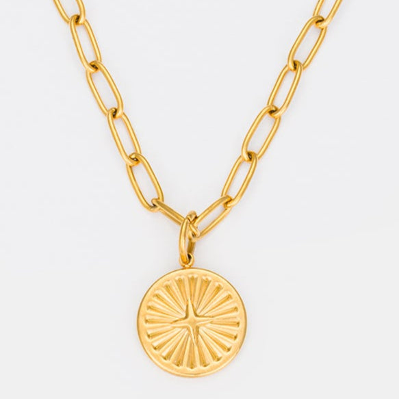 18K gold-plated North Star pendant necklace featuring a celestial engraved charm and bold gold chain