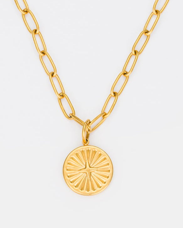 18K gold-plated North Star pendant necklace featuring a celestial engraved charm and bold gold chain