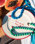Turquoise and blue gemstone necklaces styled together for summer